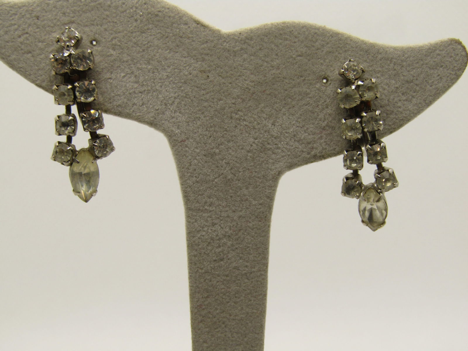 Vintage Art Deco Rhinestone Drop Earrings, Screw Back, 1.25": Vintage Art Deco Rhinestone Drop Earrings, 1.25", Silver tone, appx. 1940's. . Double row of rhinestones that end with a marquise stone at the bottom, screw back. Good condition, not signed by the mak