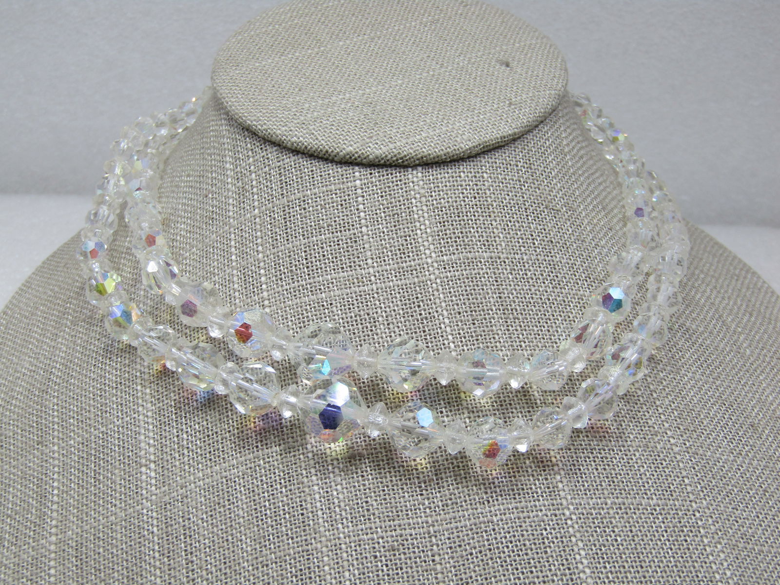 Vintage Aurora Borealis Crystal Necklace, Double-Strand, 16": Vintage Aurora Borealis Graduated Crystal Necklace, Double-Strand, 16", Rhinestones in the ends caps where the strands connect. The beads are appx. 4mm to 11mm with smaller spacer beads between. Hook