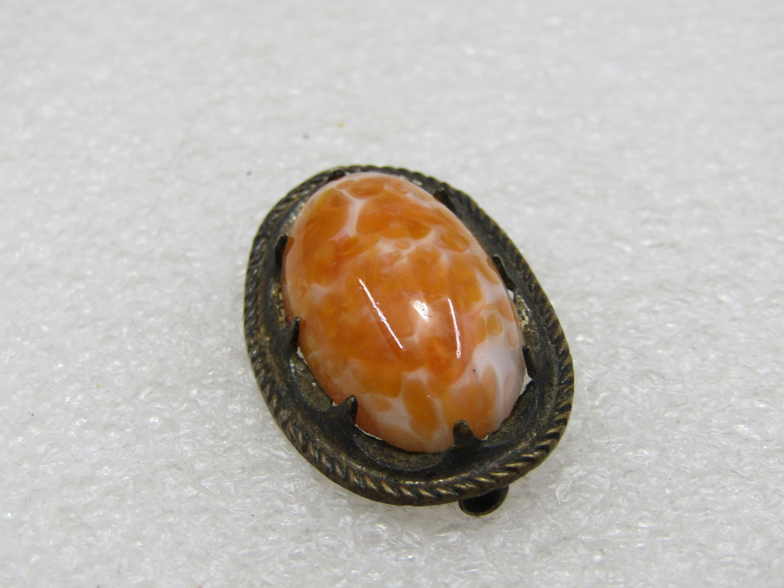 Vintage Orange & White Czech Glass Brooch, 1930's, C-Clasp,: Vintage Orange & White Czech Glass Brooch, 1930's, C-Clasp, 1.25" by 3/4" oval. Domed orange and white Czech glass that is appx. 1" by 5/8" stone with a rope and pronged accent holding the stone. The
