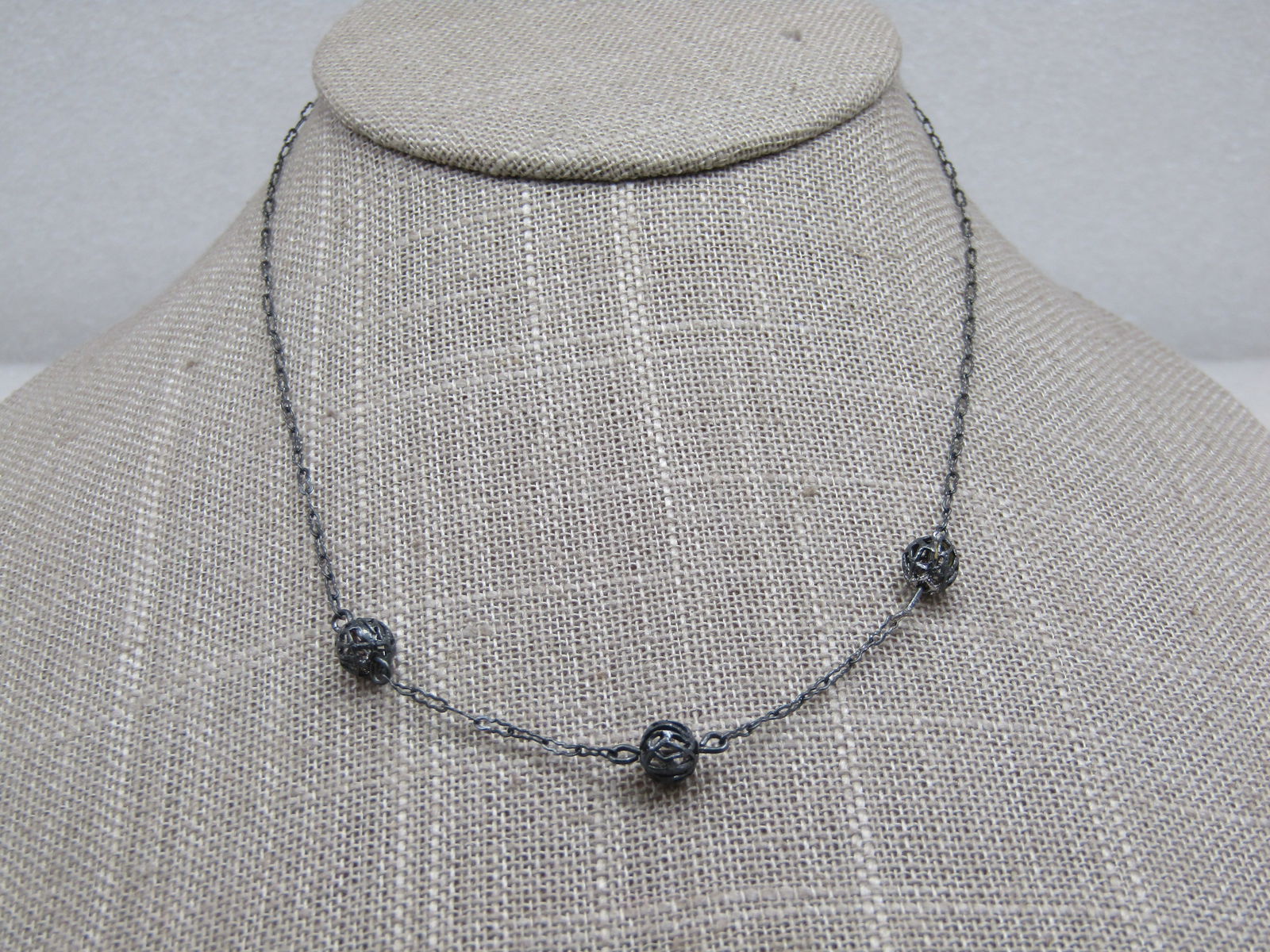 Vintage Sterling Filigree Triple Bead Necklace, 15": Vintage Sterling Filigree Triple Bead Necklace, 15", 1.86 gr. Marked stg for sterling, tested and signed CaCo. The links are almost the outline of a no. eight and appx .1.5mmmm. Age is 1920-1940's. Ve