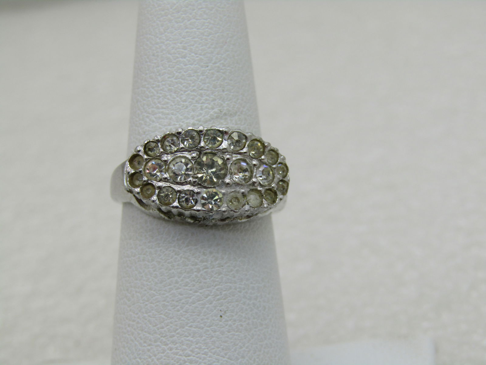Vintage Sterling Art Deco Paste Ring, Clark & Combs, 1930's-1940's, Sz. 6 (NL): Vintage Sterling Art Deco Paste Ring, Clark & Combs, 1930's-1940's, Sz. 6, Oval top to the ring with pave set rhinestones framing it with a row in the center. Signed C&C and aterling. Two stones appea