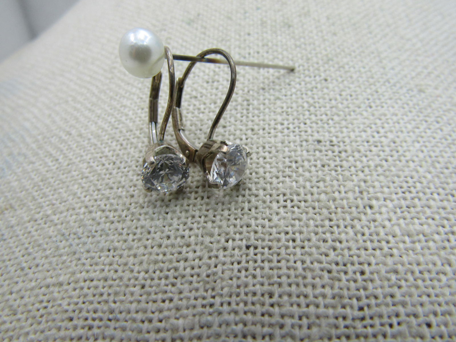 Vintage Sterling Silver CC Leverback Pierced Earrings, DQ CZ: Vintage Sterling Silver CC Leverback Pierced Earrings, DQ CZ, 6mm clear sparkling czs, round cut that hang down appx. 3/4" from the curve in the post. Signed DQ CZ and .925 (sold through TV Jewelry Sh