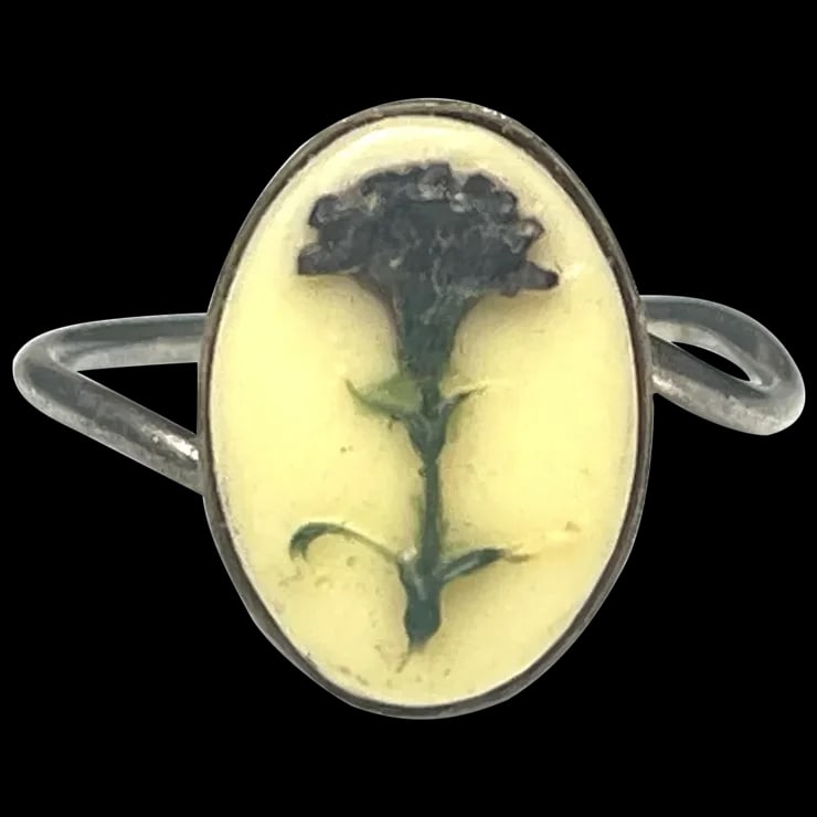 Vintage Silver Ring with Raised Flower on Ivory Colored Background: Title: Vintage Silver Ring with Raised Flower on Ivory Colored Background Description: Vintage Silver Ring with Raised Flower on Ivory Colored BackgroundHallmarked: No Hallmark Seen Tested 800 SilverW