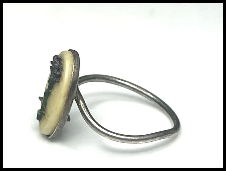 Vintage Silver Ring with Raised Flower on Ivory Colored Background - 4