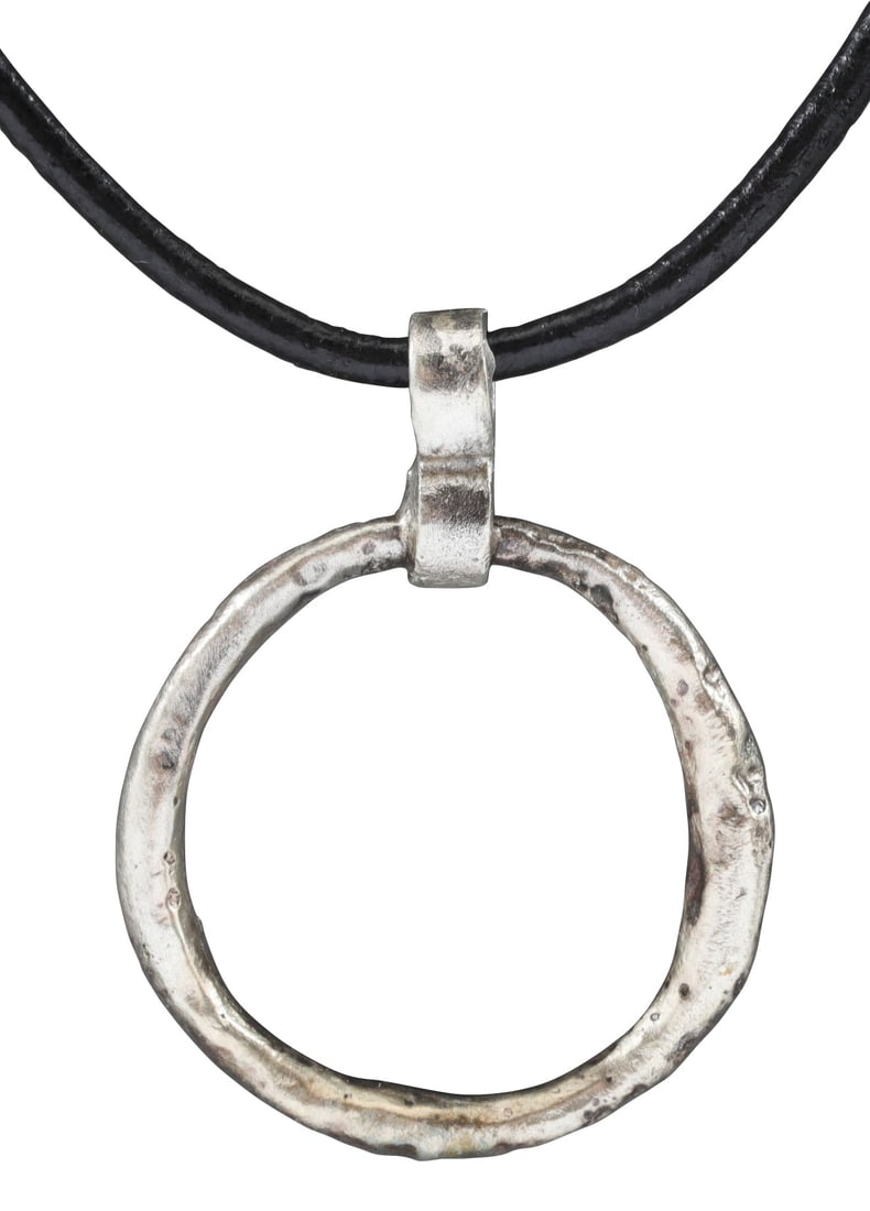 CELTIC PROSPERITY RING NECKLACE C.400-100 BC: Before the Roman invasion of the British Isles, rings of bronze, silver, and gold were used as a means of exchange, particularly in Ireland. Most exchanges of goods and property were conducted by bart