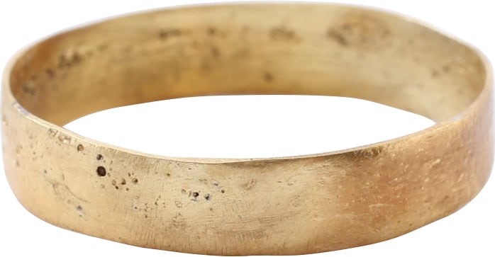 VIKING WARRIOR’S WEDDING RING, 866-1067 AD, SIZE 13.: Large size 13 for a warrior of considerable stature. 4.8mm wide band with low flat face textured from burial as shown. The pure 24karat gold surface professionally restored. Vikings exchanged rings on