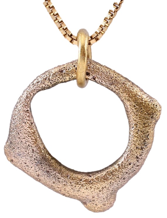 CELTIC PROSPERITY RING NECKLACE, C.400-100 BC: Before the Roman invasion of the British Isles, rings of bronze, silver, and gold were used as a means of exchange, particularly in Ireland. Most exchanges of goods and property were conducted by bart