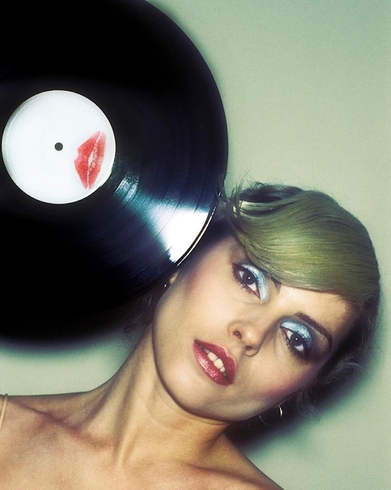 Vinyl Blondie by Martyn Goddard Signed Limited Edition: 1978 (printed later): Title: Vinyl Blondie by Martyn Goddard Signed Limited Edition: 1978 (printed later) Description: Vinyl Blondie Debbie Harry of Blondie photographed with a vinyl record in New York 1978 Photo by Martyn