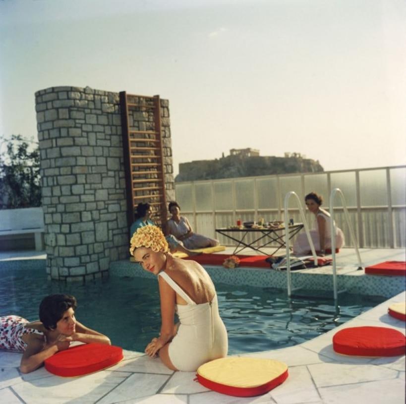 Penthouse Pool 1961 Slim Aarons Premium Collection Estate Stamped Edition: 1961 (printed later): Title: Penthouse Pool 1961 Slim Aarons Premium Collection Estate Stamped Edition: 1961 (printed later) Description: Penthouse Pool 1961 Young women by the Canellopoulos penthouse pool, Athens, July 19