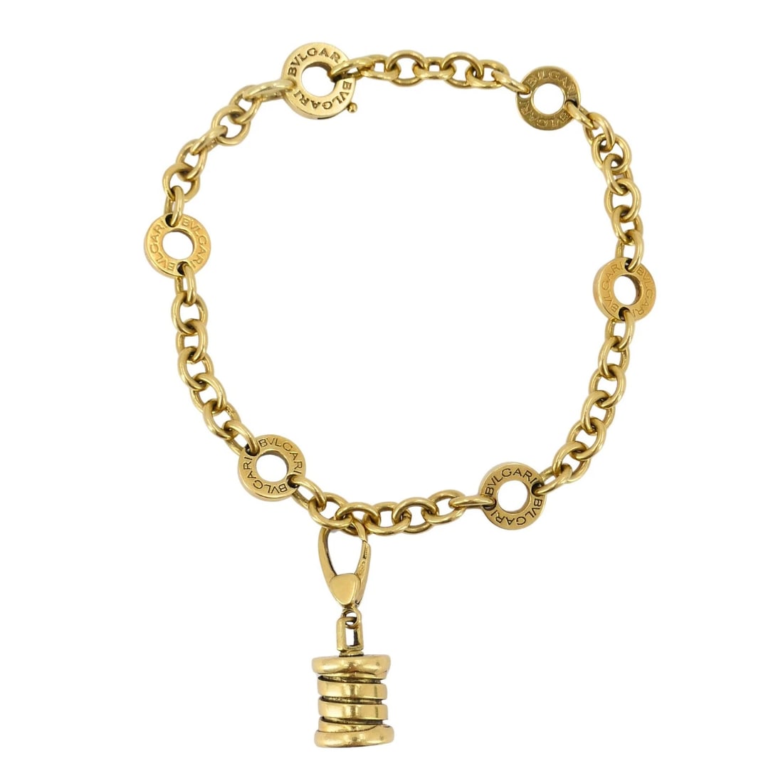 Bulgari B.zero1 18k Yellow Gold Charm Bracelet 7.75": Title: Bulgari B.zero1 18k Yellow Gold Charm Bracelet 7.75" Description: This Bulgari bracelet features a classic B.zero1 cylindrical charm suspended from a polished 18k yellow gold link chain accente