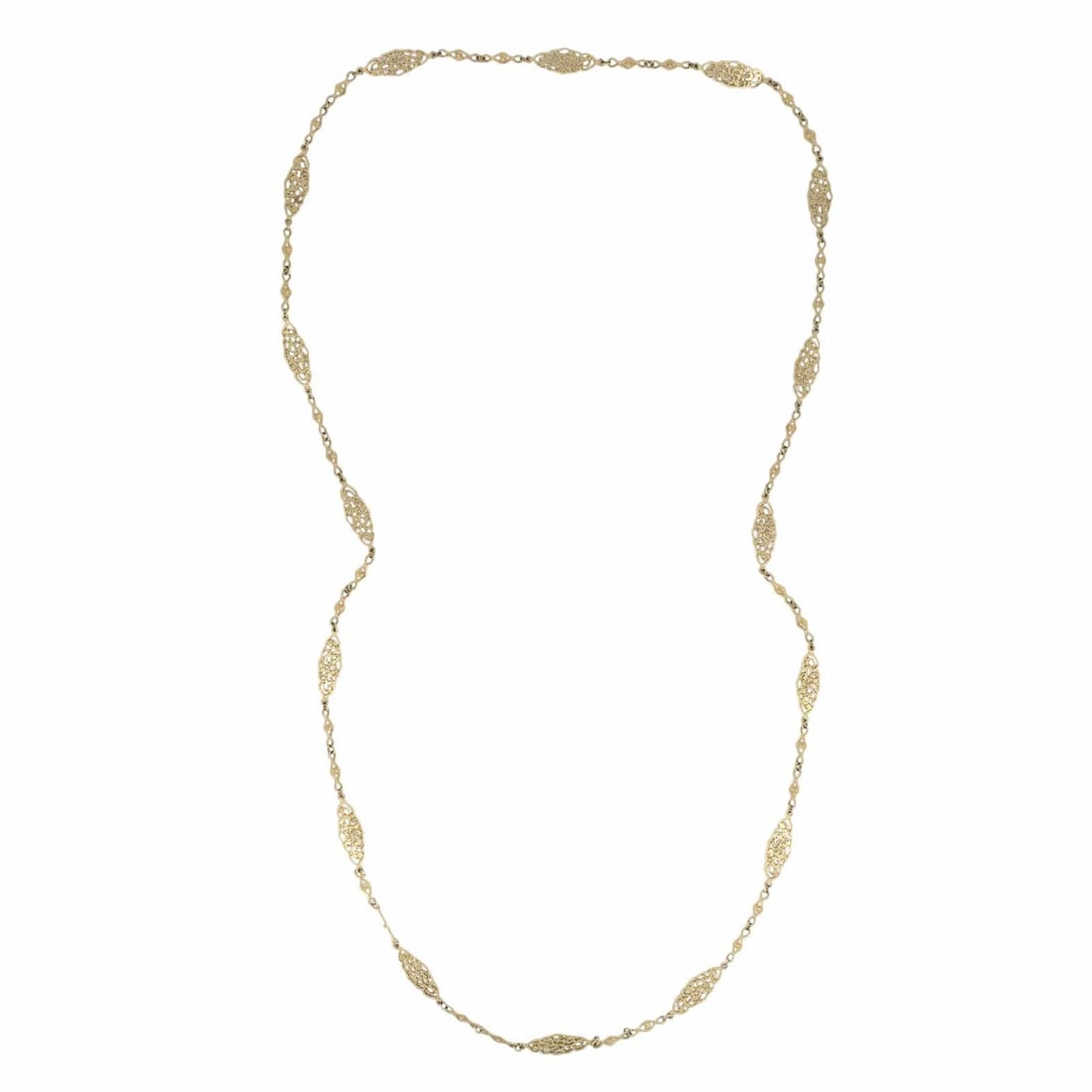 Vintage 14K Gold Openwork Filigree Marquise Long Chain Necklace: Title: Vintage 14K Gold Openwork Filigree Marquise Long Chain Necklace Description: 14K gold long chain necklace dating to the 1970s. The design features repeating openwork marquise shaped stations wi