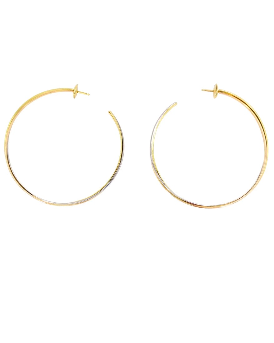 Cartier Trinity Hoop Earrings Tri-Color Gold: Title: Cartier Trinity Hoop Earrings Tri-Color Gold Description: Cartier Trinity Hoop Earrings Tri-Color old A pair of Cartier Trinity hoop earrings crafted in 18k gold and showcasing the iconic tri-c