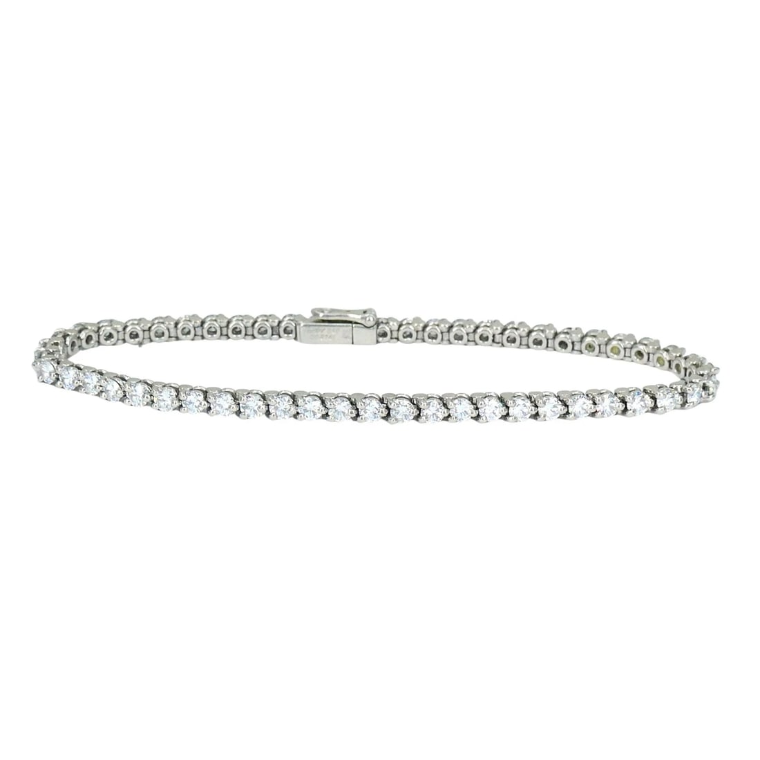 Vintage Cartier Platinum Diamond Tennis Bracelet: Title: Vintage Cartier Platinum Diamond Tennis Bracelet Description: This Cartier diamond tennis bracelet is crafted in platinum and set with a continuous row of round brilliant cut diamonds in Cartie
