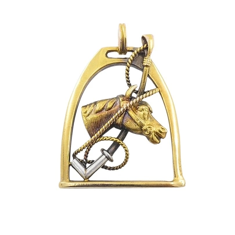 Vintage 14k Gold Equestrian Stirrup Horse Head Pendant: Title: Vintage 14k Gold Equestrian Stirrup Horse Head Pendant Description: Product details: CRCA: 1950’s MATERALS: 14K old WEHT: 3.6 rams MEASREMENTS: 13/16" x 1" TEM DETALS: Vintage 14k old Equ