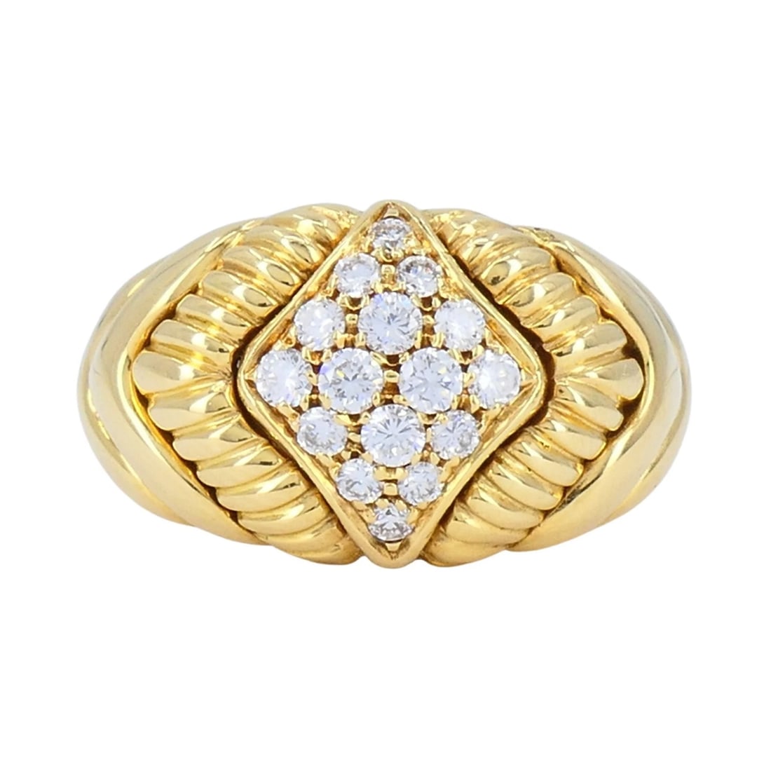 Vintage Boucheron 18k Gold Diamond Dome Ring: Title: Vintage Boucheron 18k Gold Diamond Dome Ring Description: This Boucheron ring, crafted in 18k yellow gold, dates to the late 1980s to early 1990s. The design features sculpted fluted shoulders