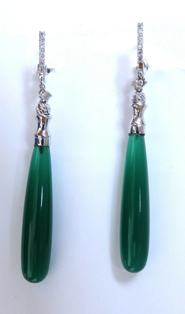 37mm extra long natural Jade drop diamond earrings 14 karat**: Title:37mm extra long natural Jade drop diamond earrings 14 karat** Description:37mm extra long natural Jade drop diamond earrings 14 karat $1,800.00 PRODUCT DESCRIPTION Extra long sleek Jade drop dan