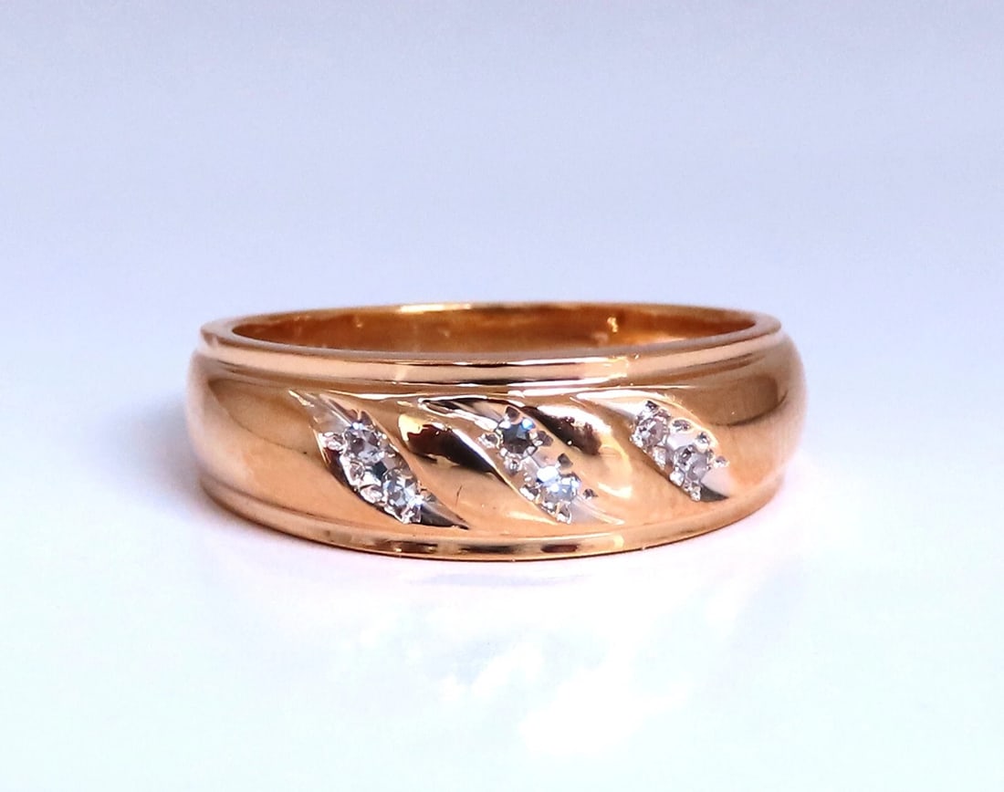 Wave Pattern Traditional Natural Diamond Band ring .08ct 14kt Gold: Title: Wave Pattern Traditional Natural Diamond Band ring .08ct 14kt Gold Description: .08ct Natural Round Cut Diamond Ring vs-2 clarity H color. 14kt yellow gold 4.2 Grams Depth: 2.6mm Width: 2mm Cur