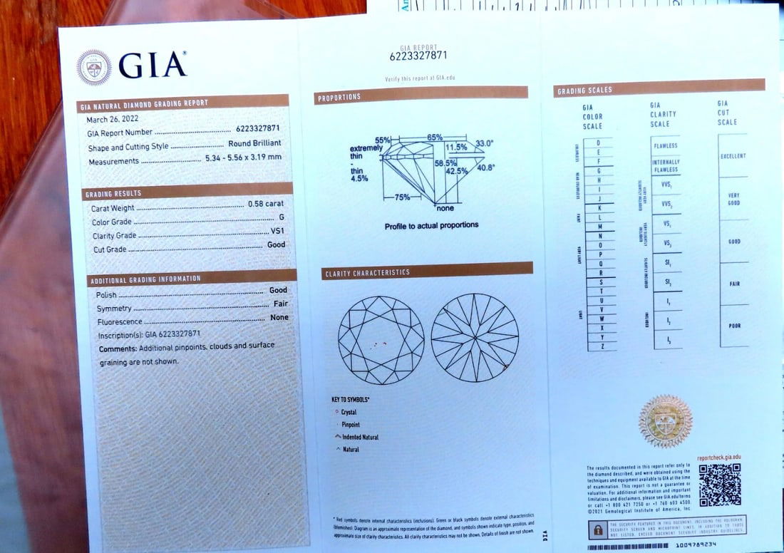 GIA Certified .58ct Natural Round Diamond solitaire ring G/Si1 - 6