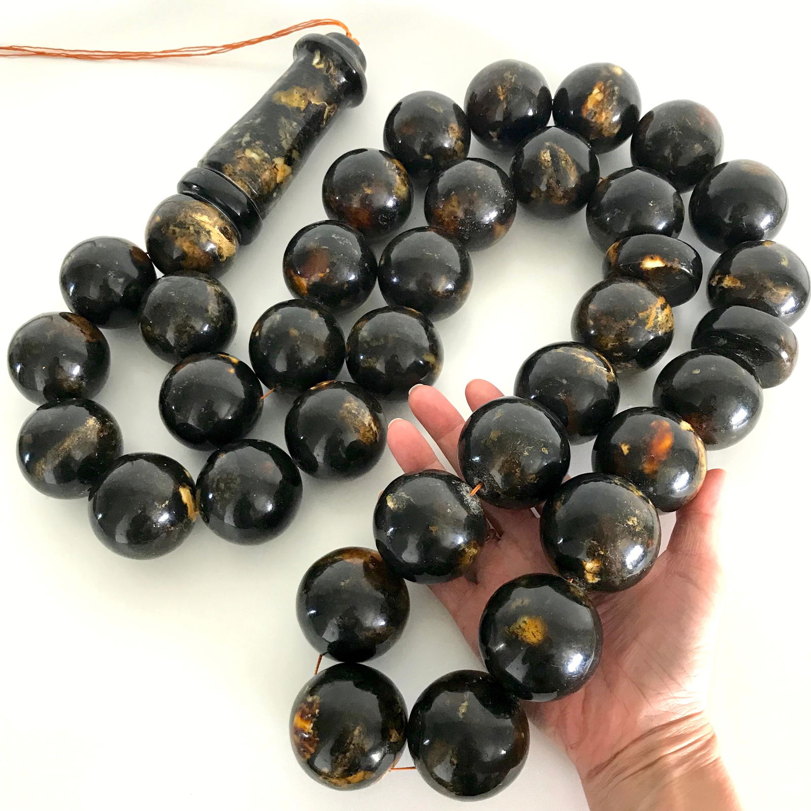 Unique and Stunning Amber Tesbih made from Round Amber beads: Title:Unique and Stunning Amber Tesbih made from Round Amber beads Metal:None Gemstone:Amber Weight:1975.0 g Size:Bead size: 45.0 x 0 mm Bead size: 1.772 x 0.0 inches Made of:(Reconstituted Amber or W