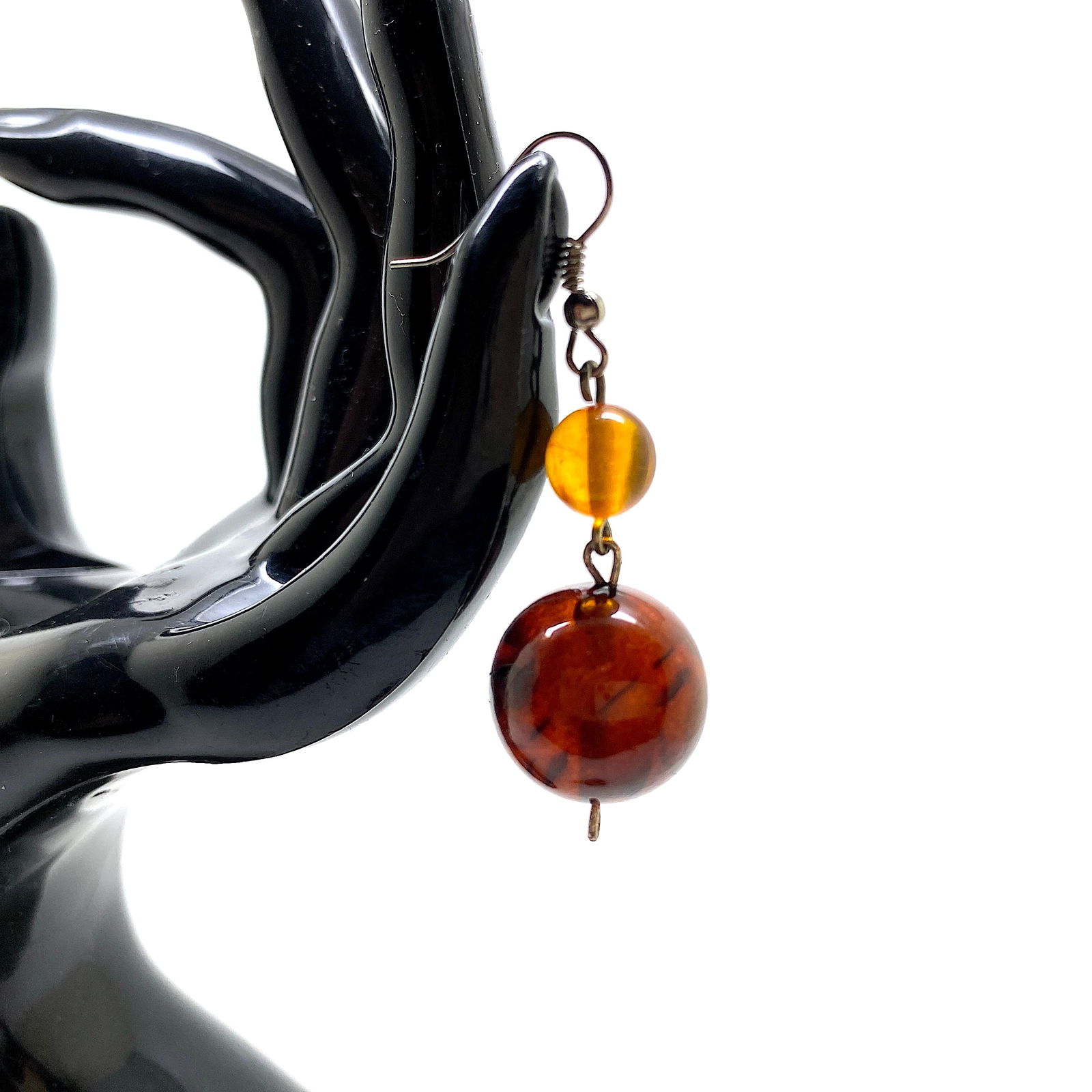 Remarkable Unique Vintage Amber Earrings: Title:Remarkable Unique Vintage Amber Earrings Metal:None Gemstone:Amber Weight:6.93 g Size:Size: 50.0 x 17.0 x 17.0 mm Size: 1.969 x 0.669 x 0.669 inches Made of:(Reconstituted Amber or Whole Stone):