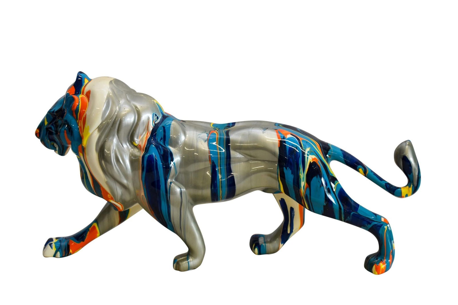 Roaming Multicolored Lion Resin Statue 19" x 5" x 9"H: Title:Roaming Multicolored Lion Resin Statue 19" x 5" x 9"HDescription:Place this piece in any space to enhance it with a colorful, creative, and animal focused piece. This roaming lion is the