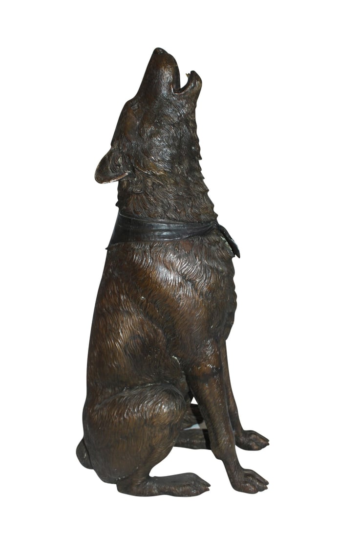 Howling Wolf Bronze Statue - Size: 16"L x 20"W x 37"H.: Title:Howling Wolf Bronze Statue - Size: 16"L x 20"W x 37"H. Description:Standing on the ground howling at the full moon, this wolf is calling for his friends. Shown in stunning detail and mounted on