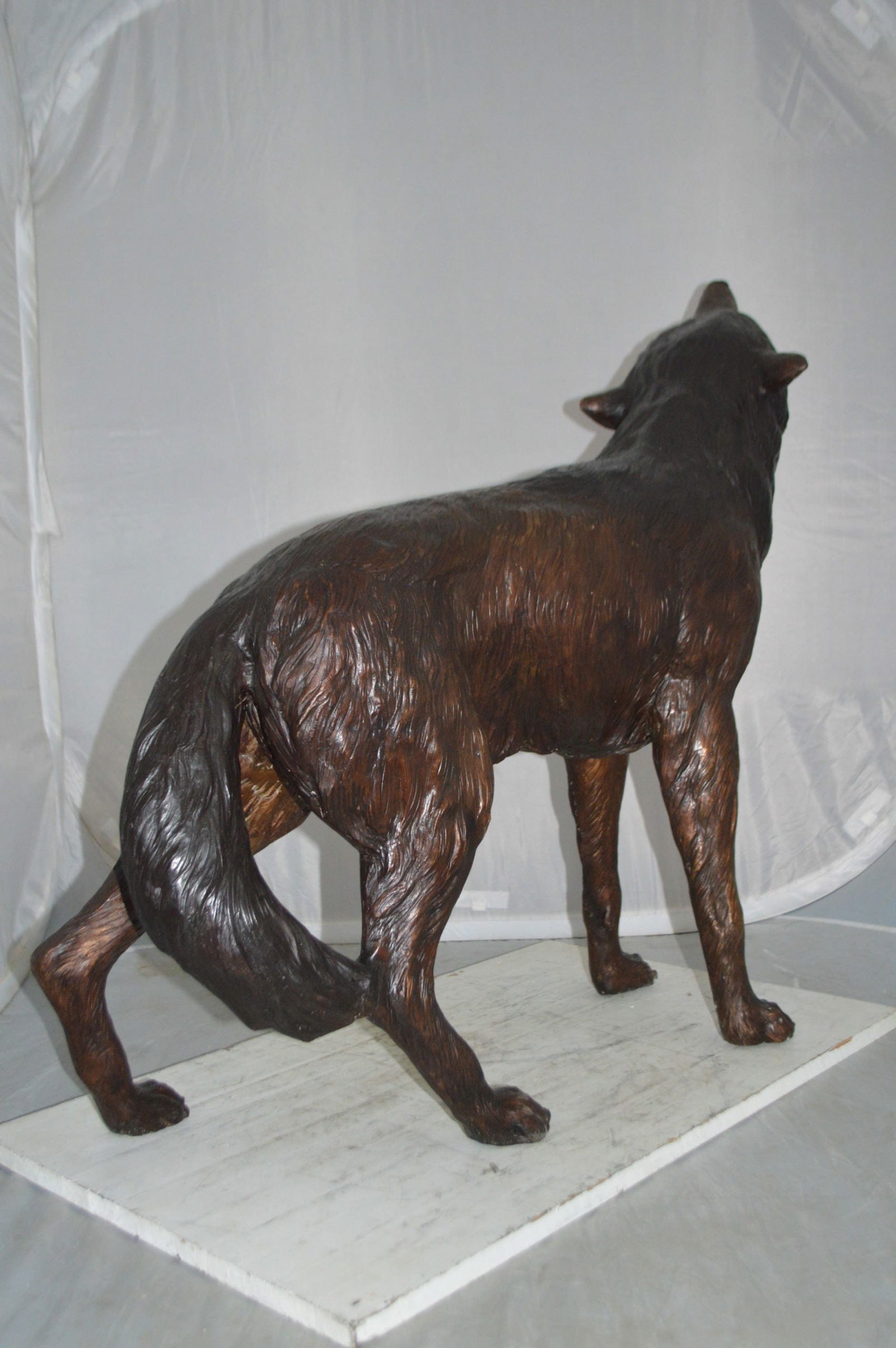 Howling Wolf Bronze Statue - Size: 40"L x 10"W x 32"H. - 3