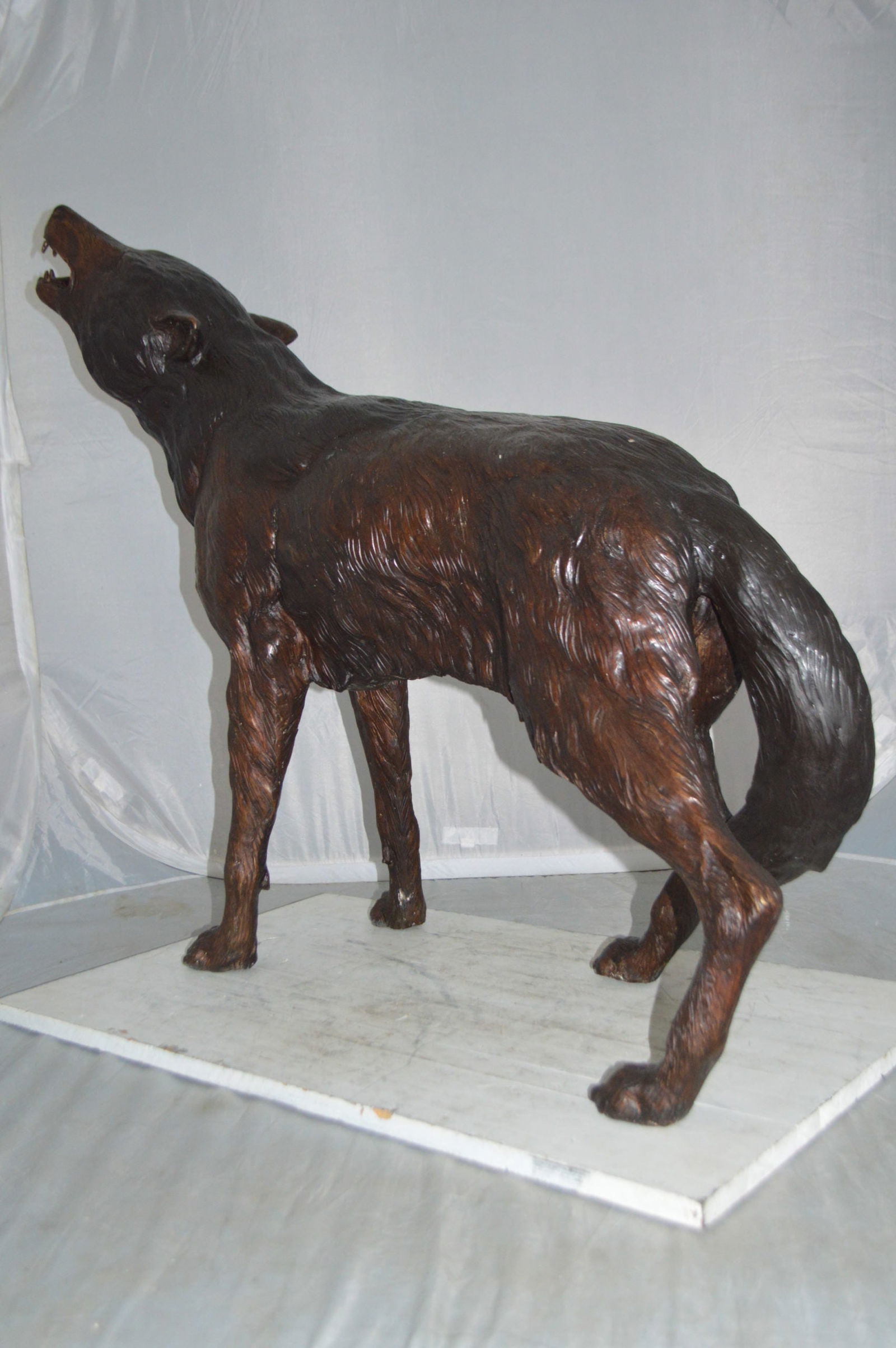 Howling Wolf Bronze Statue - Size: 40"L x 10"W x 32"H. - 5