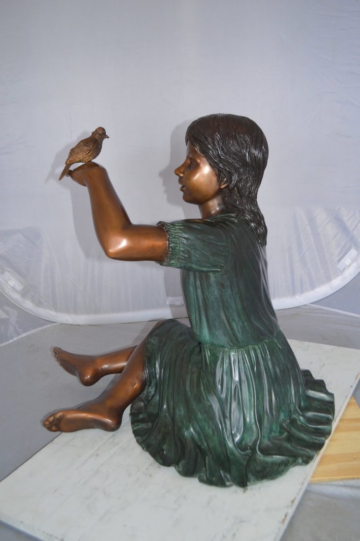Girl with a Sparrow Bronze Statue - Size: 24"L x 30"W x 25"H. - 8