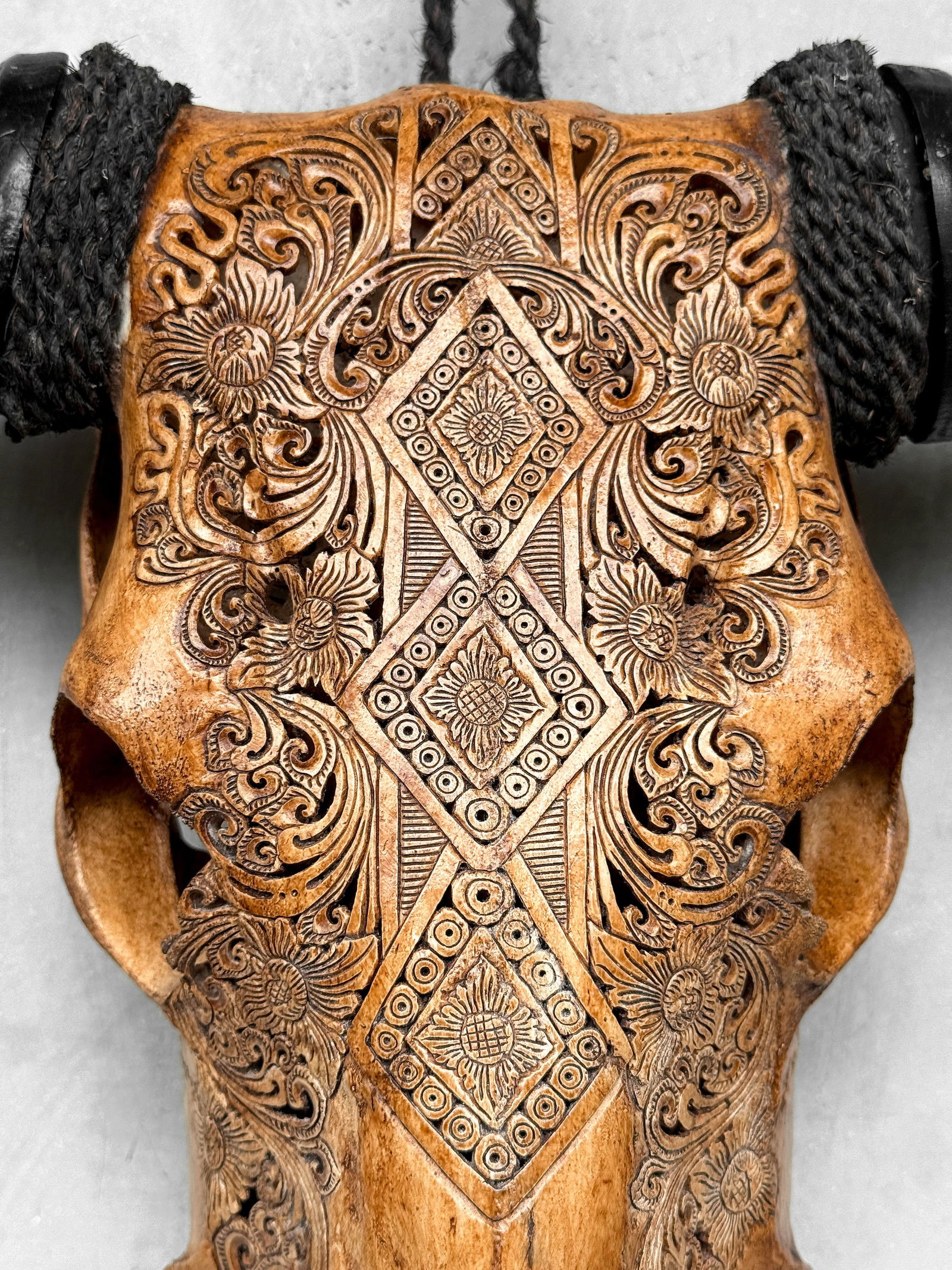 Carved brown buffalo skull - Ketupat motif - 4