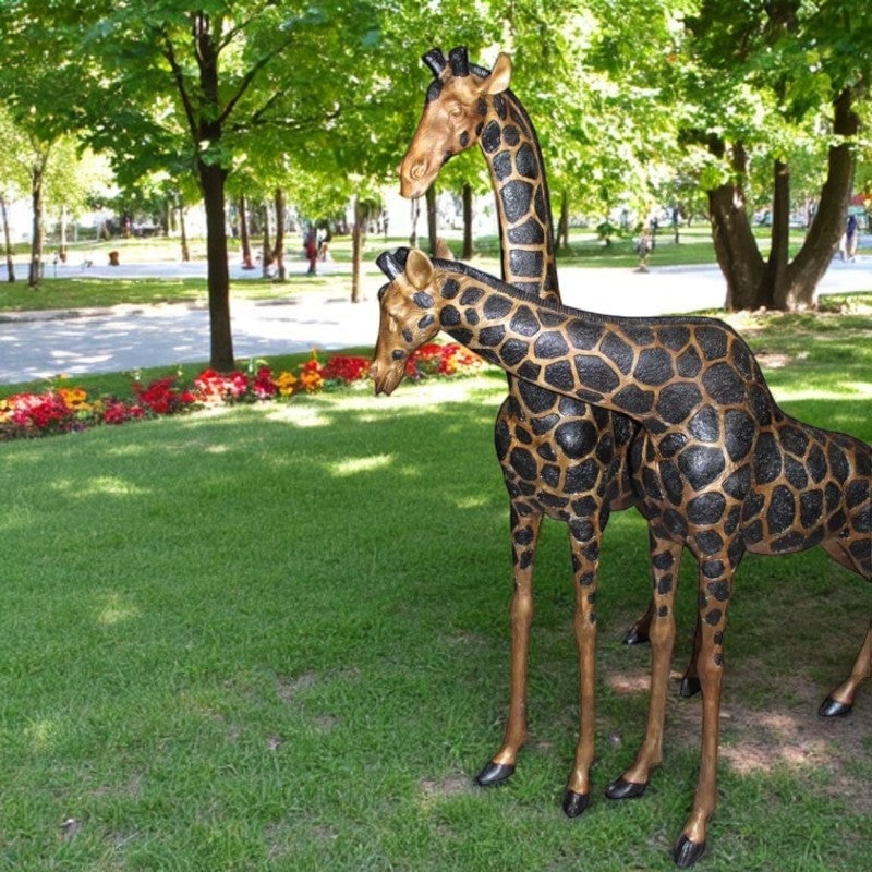 Pair of Giraffes Bronze Statues - Size: 32"L x 12"W x 55"H. - 2