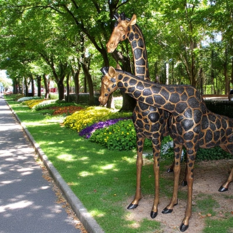 Pair of Giraffes Bronze Statues - Size: 32"L x 12"W x 55"H. - 3