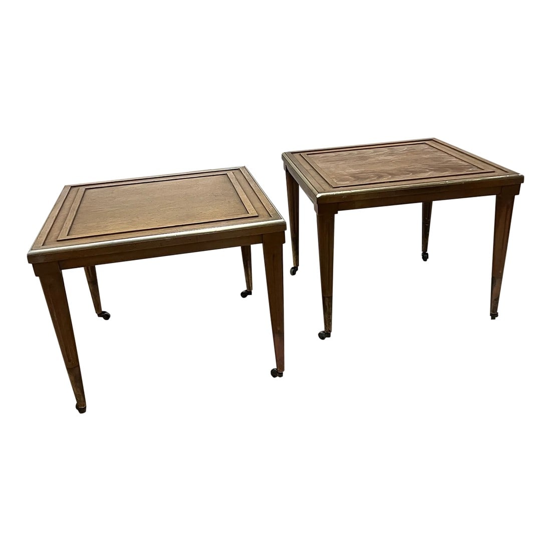 1950s Pair of Mid Century Modern Low Profile End Tables: This pair of mid century modern sides tables is simplistic, elegant with clean lines. Low rise in stature, the side tables have iconic mid century brass tip fluted cone legs on casters. Retains maker'