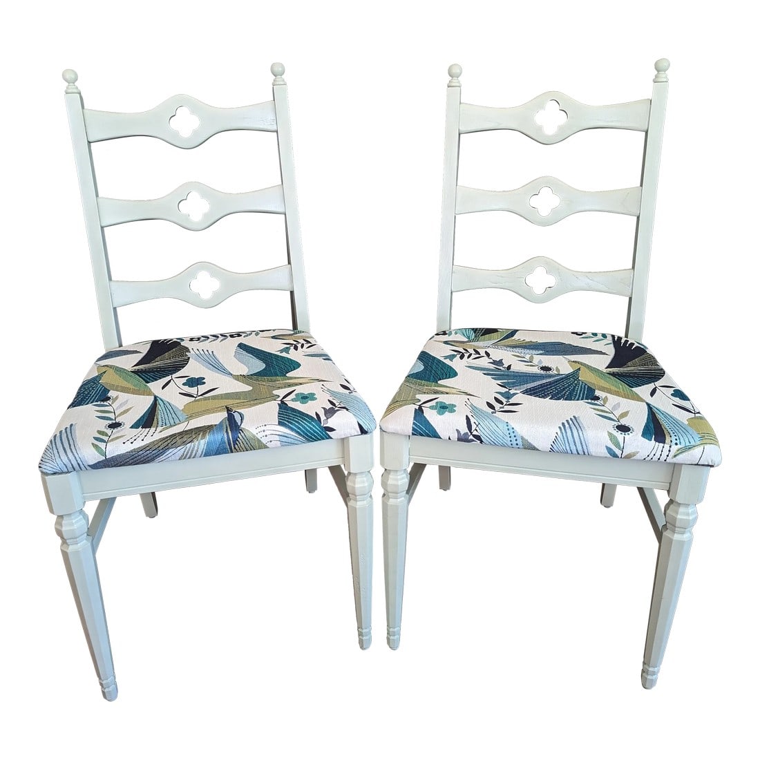 Mid 20th Century Pair of Ladderback Quatrefoil Chairs by Liberty Chair Company: Pair of ladderback chairs with quatrefoil cutouts. Made by Liberty Chair Company in the 1950's. In excellent vintage condition, newly painted and reupholstered. Color: October Mist by Benjamin Moore F