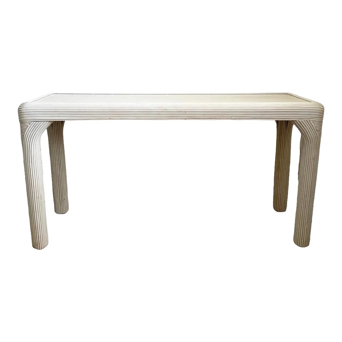 1980s Vintage Pencil Reed Console Table: Vintage pencil reed console table. Sturdy wood frame is enveloped in thick pencil reed and stained a creamy blonde finish. Condition: Alterations: Original Condition Unaltered Imperfections: Some Impe