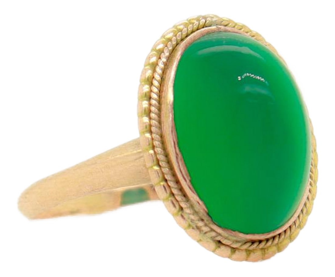 Edwardian 14k Gold & Chrysoprase Sugarloaf Cabochon Ring: A fine antique Edwardian cabochon ring. In 14 karat yellow gold. Bezel-set with an oval chrysoprase sugarloaf cabochon in a beaded & twisted wire setting. Marked 14k to the shank. Simply a wonderful v