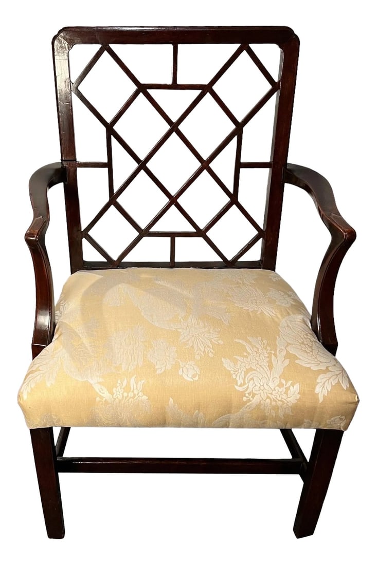 George III Mahogany Lattice Back Armchair: George III Mahogany Lattice back armchair. Seat with new top fabric. The rectangular lattice back above an upholstered tight seat with mahogany arms on square legs & stretchers. Chair was tightened, t