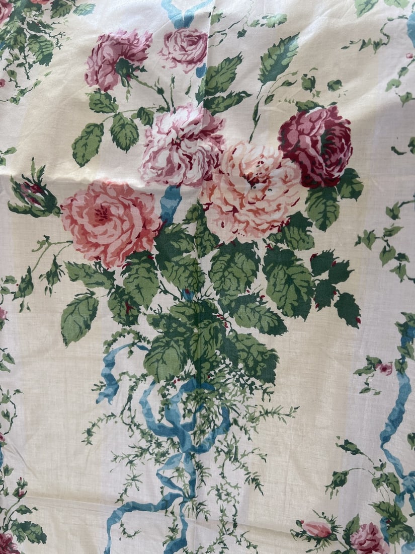 Brunschwig & Fils Floral Print "Millicent"? Fabric: Lovely floral vintage print from brunschwig&Fils perfect for pillows or a small cushion.Pink roses with blue ribbons on yellow and cream stripe ground Measures 27" wide by 36" long. Condit