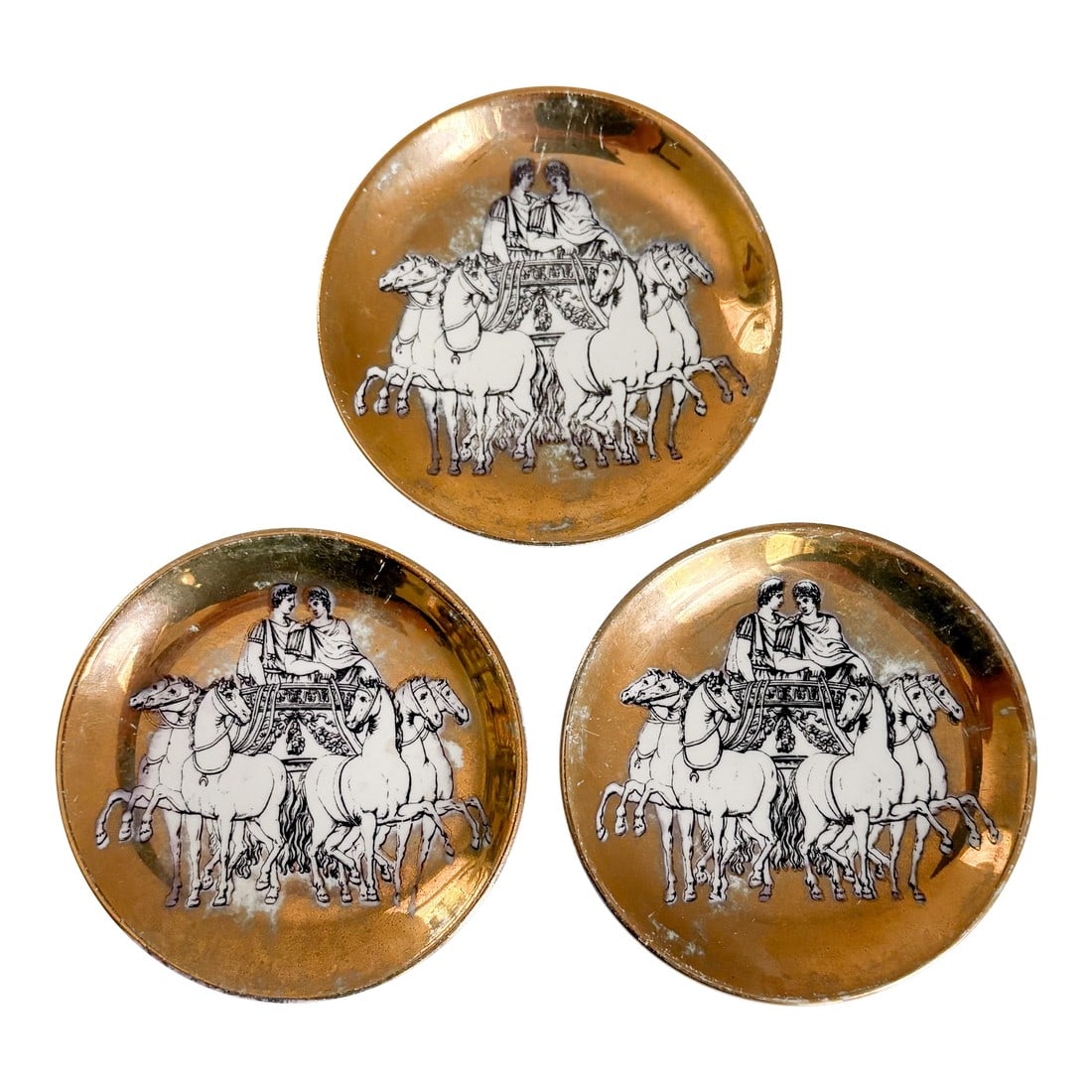 1960s Fornasetti 'Romulus and Remus' Themed Ceramic Coasters- Set of 3: This captivating set of 3 "Romulus and Remus" porcelain coasters feature the two (in)famous brothers proudly riding a chariot and seemingly in conversation. (These brothers, as far as Roman mythology