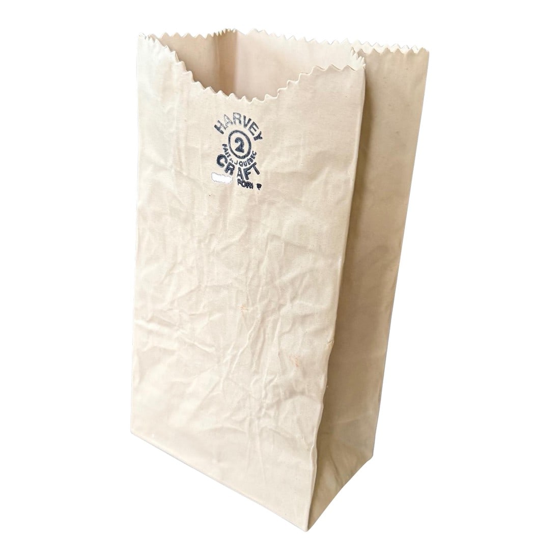 1980s Michael Harvey Ceramic Paper Bag Vase: This is a fantastic piece of pop art. Designed by Michael Harvey this is a realistic paper bag ceramic vase. This piece is made of slip cast ceramic and was produced during the 1970s and 1980s. The va