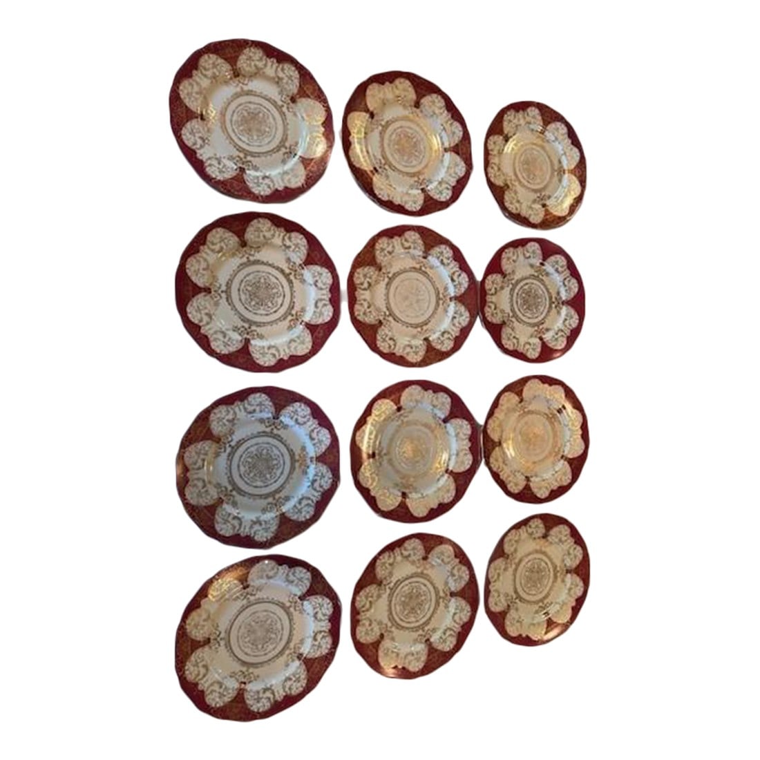 Vintage Hohenberg Studios Black Knight Dinner Plates- Set of 12: A set of 12 vintage dinner plates by Black Knight Hohenberg Studios based in Bavaria. Backstamped and hand numbered 576. Gorgeous red and cream with gold decoration and rim and scalloped edge detail.