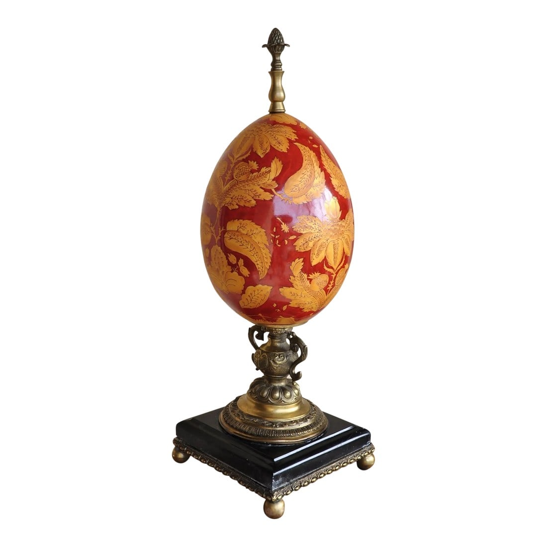 Vintage Hand-Painted Porcelain Egg Sculpture Centerpiece on Brass and Marble Stand: (YOU CAN MAKE REASONABLE OFFERS). This is a porcelain egg shaped object de arte (centerpiece) on a brass and black marble pedestal. Bottom of the base has 4 supporting brass balls. The ovoid egg has b