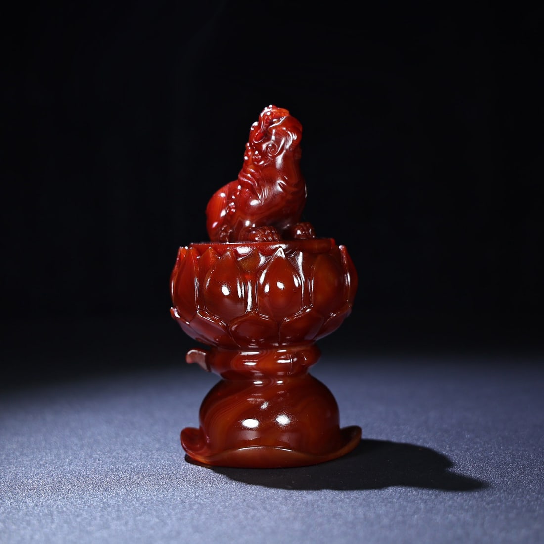 Chinese Red Agate Hand Carved Lotus Lion Incense Burner: Title: Chinese Red Agate Hand Carved Lotus Lion Incense Burner Origin: Chinese Date/Period: After2000 Materials: Red Agate Dimensions: 160x85(mm) 6.30x3.35(inches) Weight 1.12 lbs/510g Reserve: $1,699