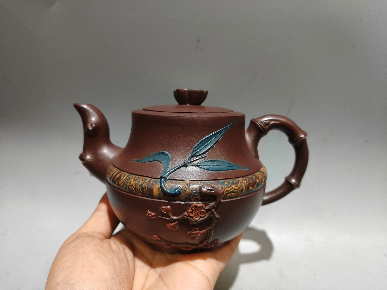 Antique Chinese Yixing Zisha Fortune Bamboo & Plum Flower Design Teapot: Title: Antique Chinese Yixing Zisha Fortune Bamboo & Plum Flower Design Teapot Origin: Chinese Date/Period: Materials: Yixing Zisha Dimensions: 170 x 110 (mm)6.69 x 4.33 (inches)Capacity: 420 ml 