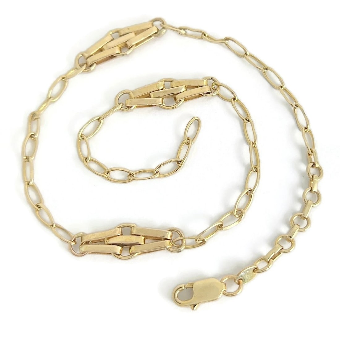 Italian Station Chain Anklet Bracelet 14K Yellow Gold, 11.25 Inches, 5.47 Gram: Italian Station Chain Anklet Bracelet 14K Yellow Gold, 11.25 Inches, 5.47 Gram This is a unique anklet. Please let us know if you have any questions. Metal: 14K yellow gold Weight: 5.47 grams Stamped:
