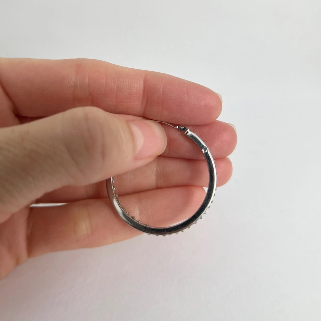 Thin Inside-Out Rhinestone Hoop Earrings 10K White Gold, 1.25 Inches, 1.63 Grams - 10