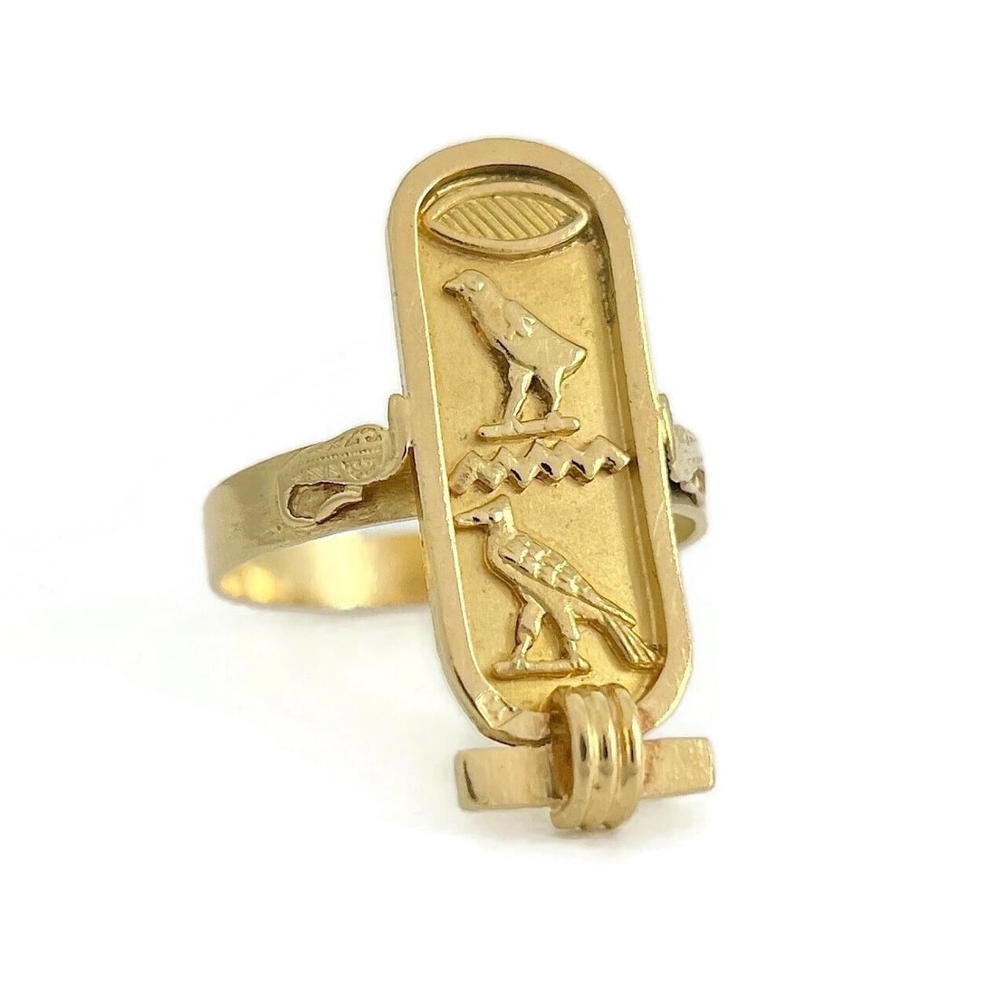 Estate Long Hieroglyphic Egyptian Bird Cartouche Ring 18K Yellow Gold, 5.51 Gram: Estate Long Hieroglyphic Egyptian Bird Cartouche Ring 18K Yellow Gold, 5.51 Gram Make a statement with this one-of-a-kind ring. Please let us know if you have any questions. Metal: 18K yellow gold Wei