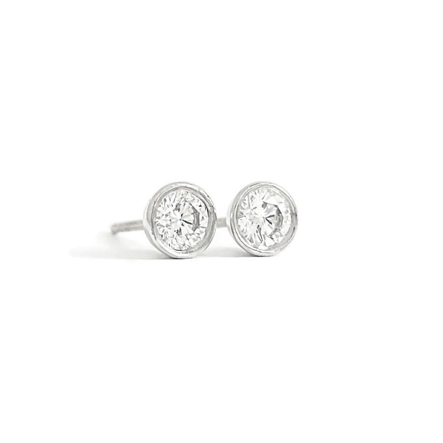 Round Diamond Bezel Stud Earrings 14K White Gold, .37 CTW: Round Diamond Bezel Stud Earrings 14K White Gold, .37 CTW These are lovely earrings! Please let us know if you have any questions. Diamonds: 2 round brilliant cuts, .37 ctw, G, VS2 Metal: 14K white go