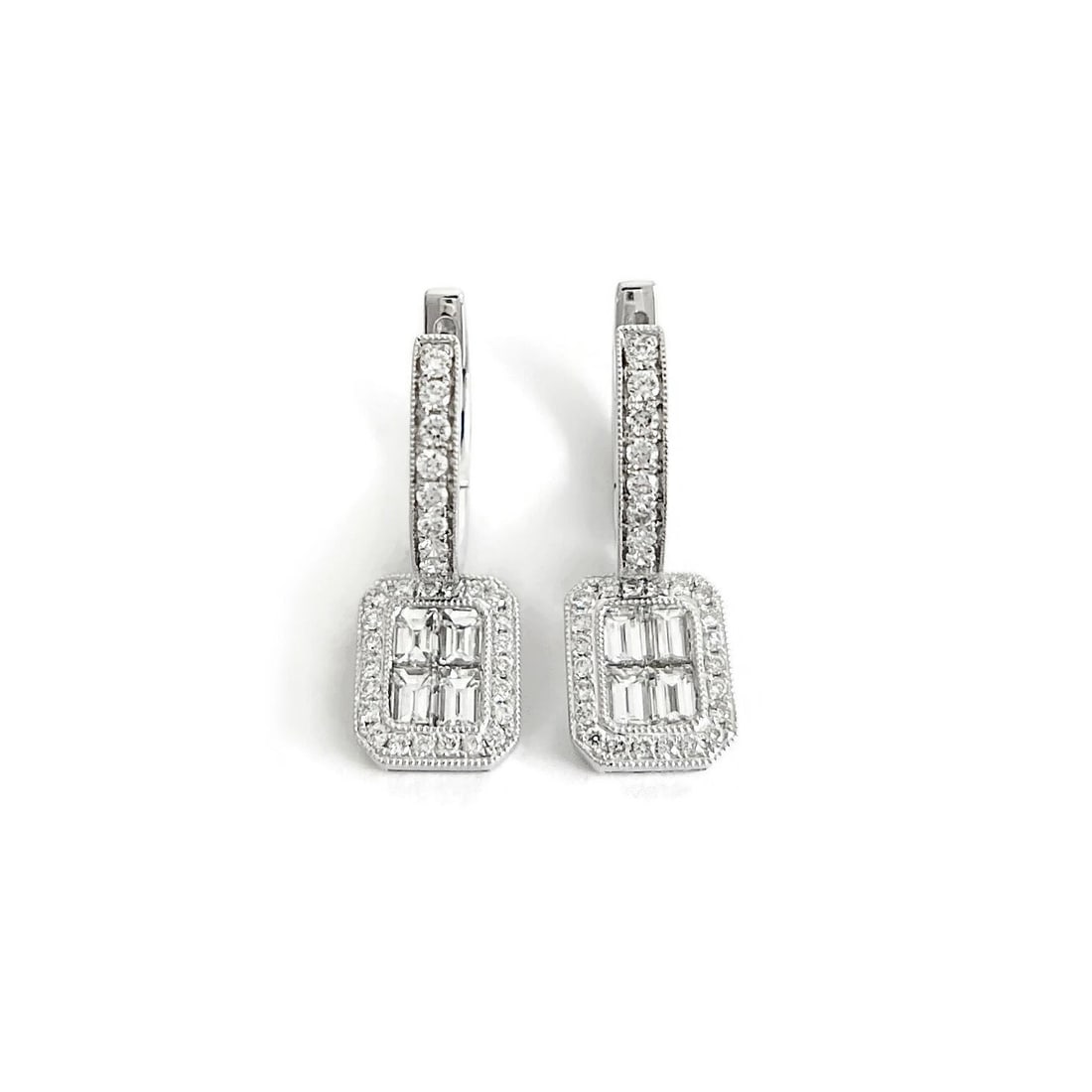 Baguette Diamond Halo Dangle Drop Earrings 18K White Gold, .94 CTW: Baguette Diamond Halo Dangle Drop Earrings 18K White Gold, .94 CTW These are beautiful earrings! Please let us know if you have any questions. Diamonds: .94 ctw; 8 baguettes .40 ctw, F-G, VS1-VS2; 60