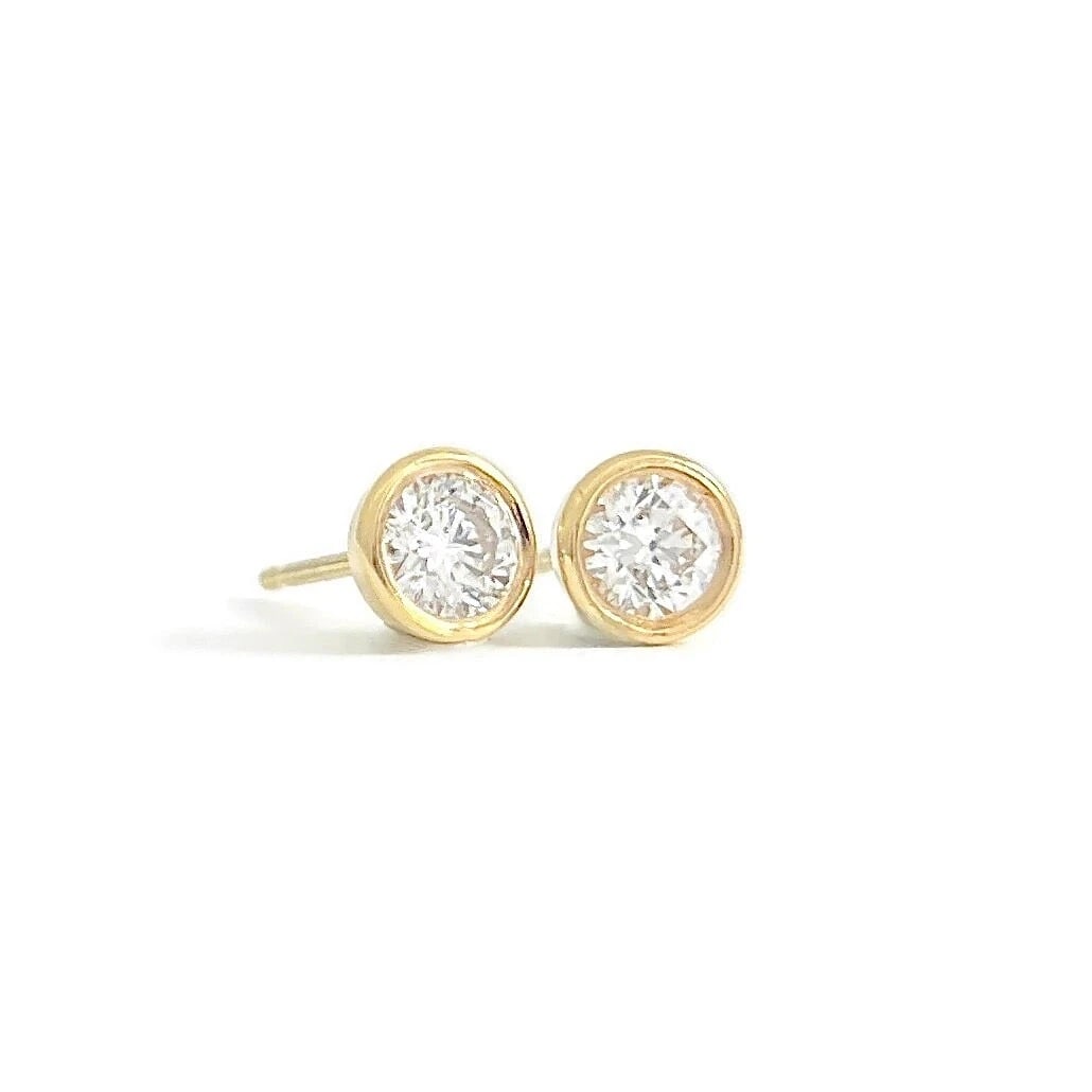 Round Bezel Diamond Stud Earrings 14K Yellow Gold .46 CTW: Round Bezel Diamond Stud Earrings 14K Yellow Gold .46 CTW These are lovely earrings! Please let us know if you have any questions. Diamonds: 2 round brilliant cuts, .46 ctw, F, SI2-I1 Metal: 14K yello